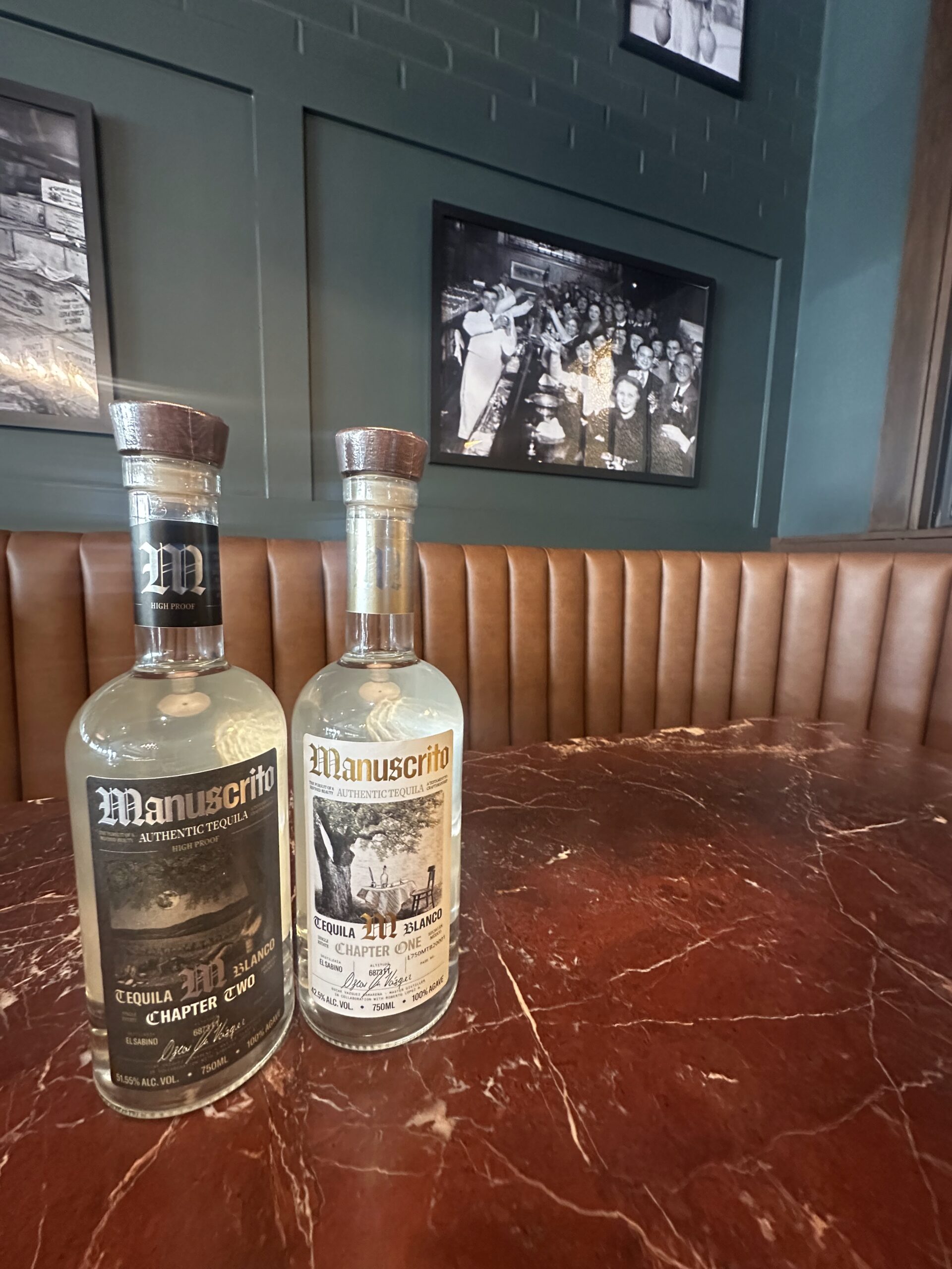 Two bottles of Manuscrito Tequila on a table at the Eleanor Room in Greendale WI